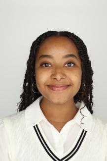 Professional Headshot of Aida, a Reservations Staff member.