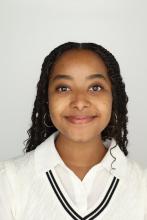 Professional Headshot of Aida, a Reservations Staff member.